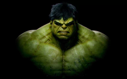 A close-up image of the Hulk, showcasing his intense expression and muscular physique, set against a black background, designed as a high-definition PC desktop wallpaper.