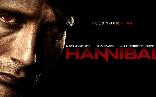 HD PC desktop wallpaper featuring a close-up of a character from the TV show Hannibal with intense red eyes and the tagline Feed Your Fear.