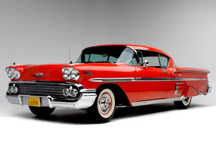 A striking red 1958 Chevrolet Bel Air showcased as an HD desktop wallpaper, highlighting its classic design and chrome accents for car enthusiasts.