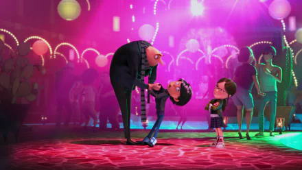 HD desktop wallpaper from Despicable Me 2 featuring Gru bending down to talk to his son while Margo stands nearby in a vibrant, colorful party scene.