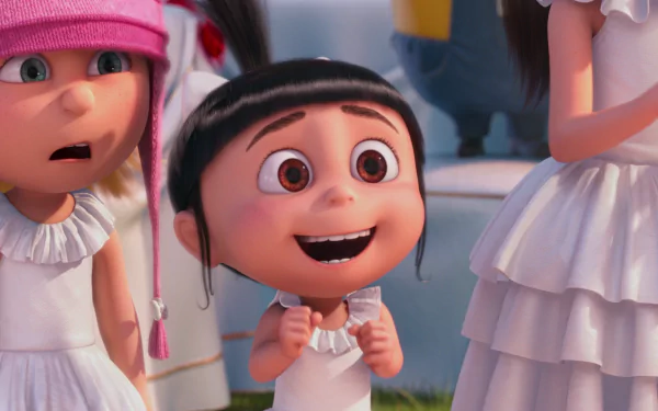 HD wallpaper featuring Edith and Agnes from Despicable Me 2. Agnes stands excitedly in the center with a big smile, while Edith looks surprised on the left, both dressed in white.