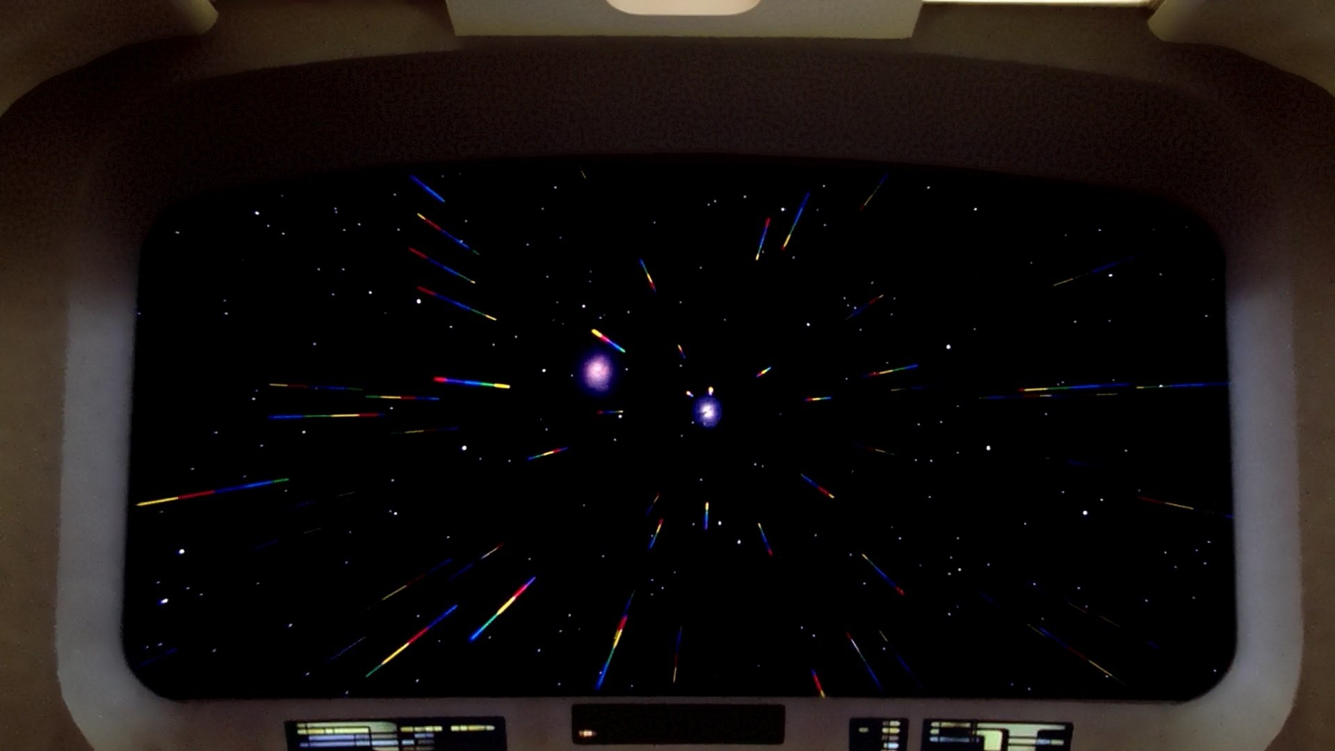 HD PC desktop wallpaper featuring the iconic warp-speed starfield view from the TV show Star Trek: The Next Generation bridge.