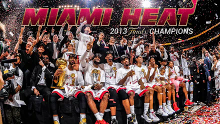 HD desktop wallpaper featuring the Miami Heat team celebrating their 2013 Finals Championship victory with confetti.