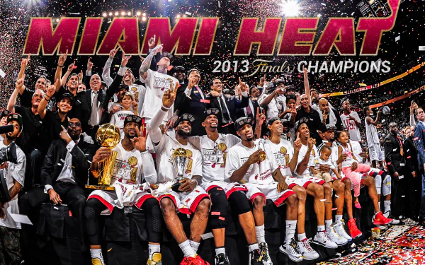 HD desktop wallpaper featuring the Miami Heat team celebrating their 2013 Finals Championship victory with confetti.