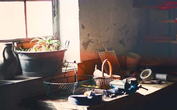 A vintage-style photography scene of a rustic windowsill with various baskets and household items, captured in 4K Ultra HD for PC desktop wallpaper and background.