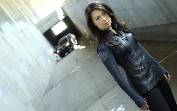HD PC desktop wallpaper featuring a character from the TV show Agents of S.H.I.E.L.D. standing confidently in an urban tunnel setting.