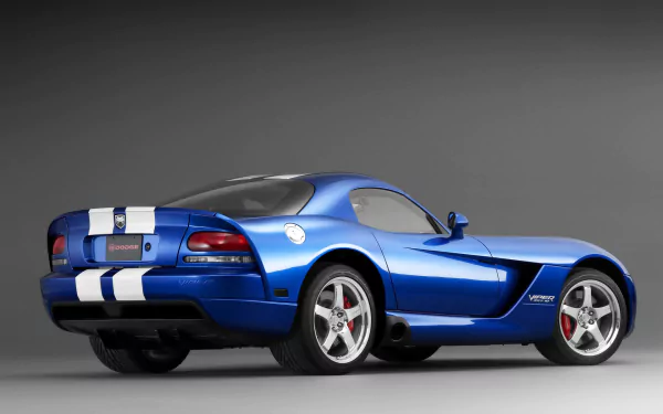 HD desktop wallpaper of a blue Dodge Viper SRT-10 vehicle with white racing stripes, showcased against a gray background.