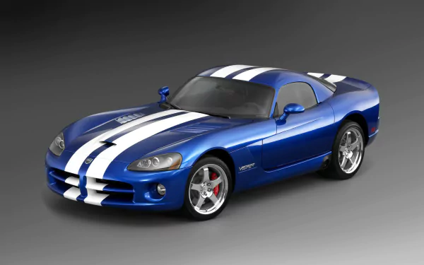 HD PC desktop wallpaper of a blue Dodge Viper SRT-10 sports car with white racing stripes against a neutral gray background.