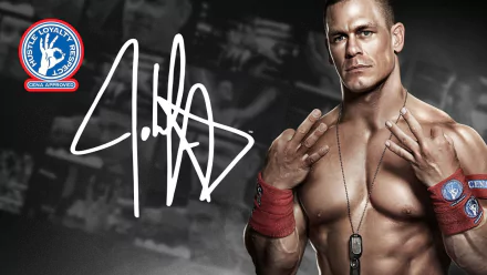 HD WWE John Cena desktop wallpaper featuring the wrestler in a powerful pose with his signature logo and autograph.