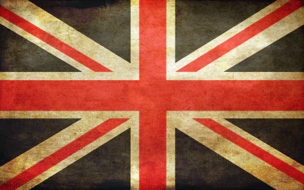 A vintage-style HD wallpaper featuring the Union Jack flag, with a textured background that enhances its classic and patriotic appeal.