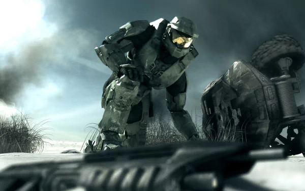 HD PC desktop wallpaper featuring Master Chief from the video game Halo: Combat Evolved, shown in detailed armor amidst a battle-worn, smoky environment.