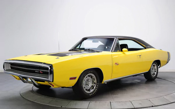HD PC desktop wallpaper featuring a yellow Dodge Charger R/T 426 Hemi, showcasing the classic muscle car's sleek design and powerful stance.