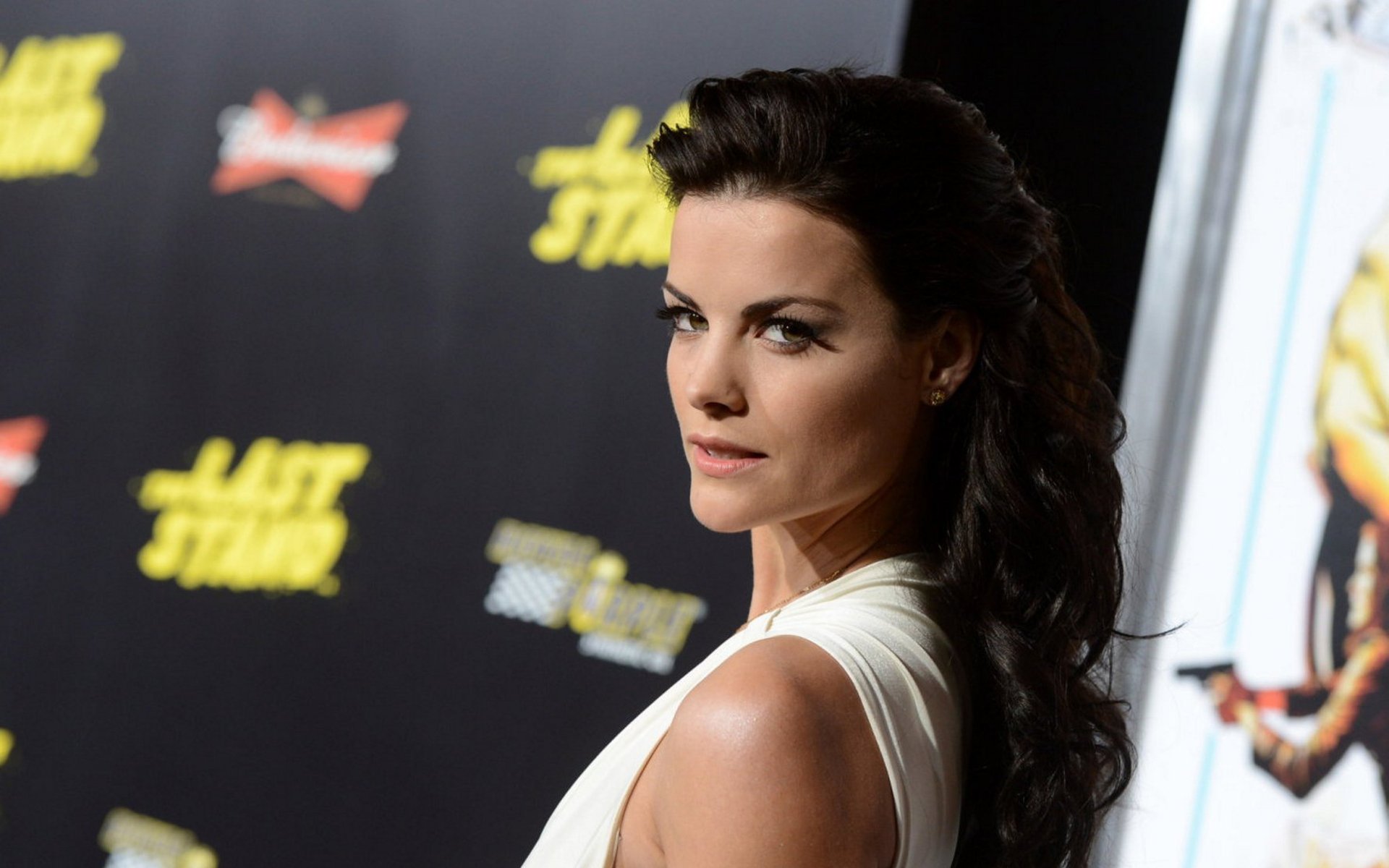 HD desktop wallpaper featuring American actress and celebrity Jaimie Alexander posing at a premiere event.