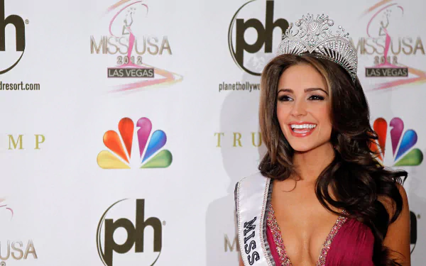 HD desktop wallpaper featuring American model and celebrity Olivia Culpo wearing a crown and sash at the Miss USA Las Vegas event.