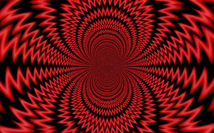 A vibrant abstract wallpaper featuring a red kaleidoscope illusion, creating an eye-catching pattern that draws the viewer into a spiraling vortex.