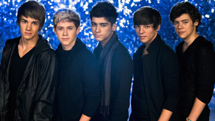 A vibrant HD wallpaper featuring One Direction, showcasing the five members standing confidently against a sparkling blue backdrop, embodying the energy of their music.