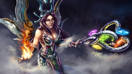Nu Wa from the video game Smite stands confidently, wielding a mystical staff with vibrant gems, surrounded by mist, showcasing her powerful presence in this HD desktop wallpaper.