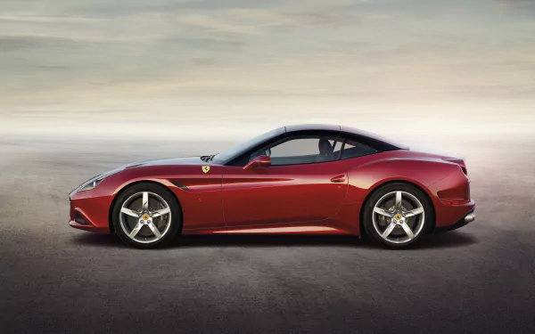 HD desktop wallpaper featuring a sleek red Ferrari California T sports car against a muted background, showcasing its elegant design and performance.