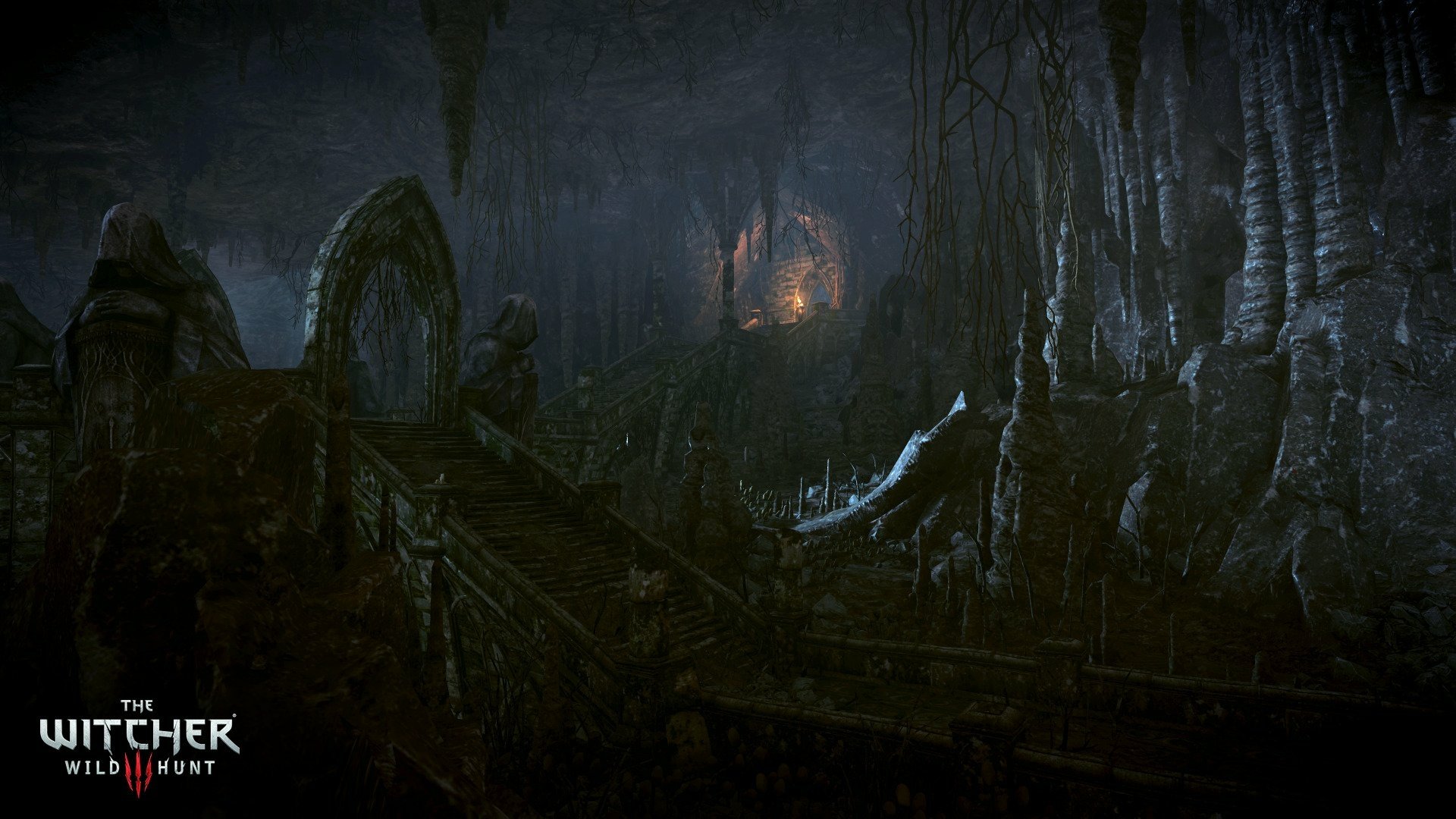 Dark, atmospheric HD PC desktop wallpaper from The Witcher 3: Wild Hunt video game, featuring a mysterious cave illuminated by distant flames.