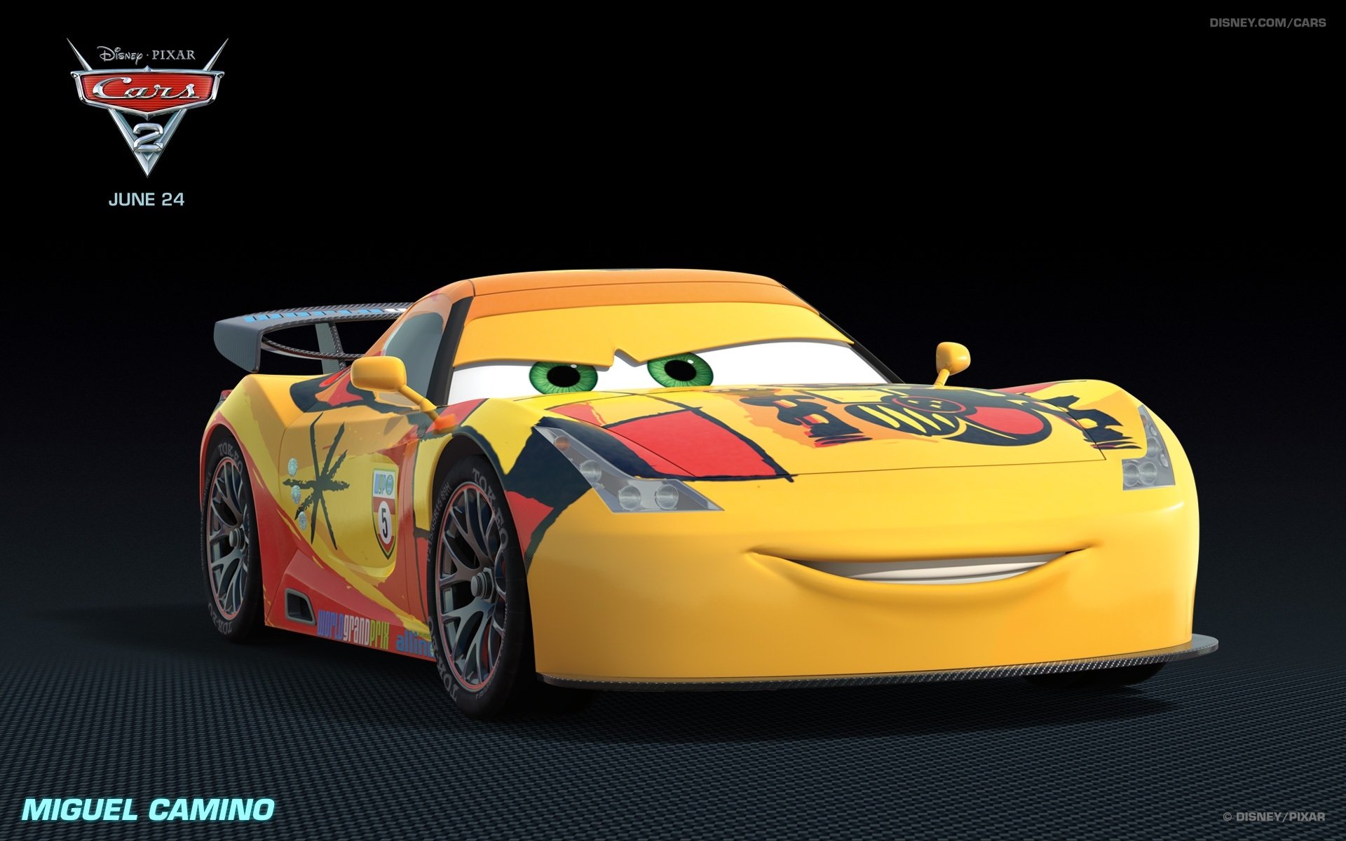 HD PC desktop wallpaper featuring Miguel Camino, a sleek yellow racecar character from the movie Cars 2, set against a black background with the Cars 2 logo and release date.