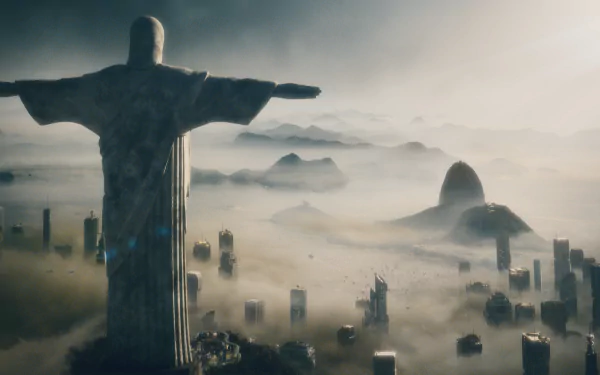 HD wallpaper of Civilization: Beyond Earth depicting a colossal statue overlooking a foggy, futuristic cityscape.