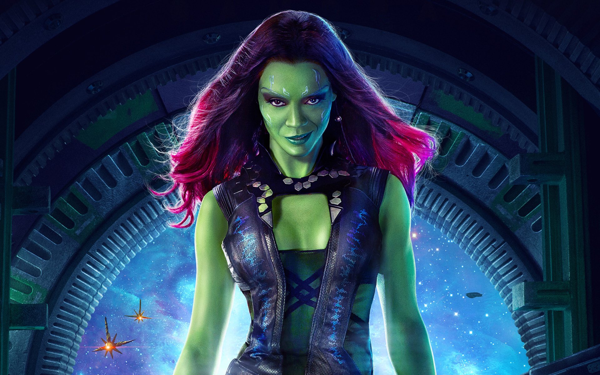 Zoe Saldana as Gamora from Guardians of the Galaxy features an HD wallpaper showcasing her vibrant green skin and striking purple hair against a cosmic background.