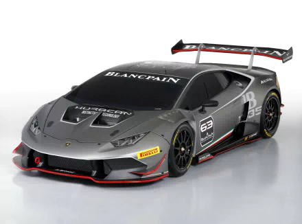 A sleek Lamborghini Huracan supercar, featuring a striking design with aerodynamic details and a prominent rear wing, serves as an impressive HD desktop wallpaper.