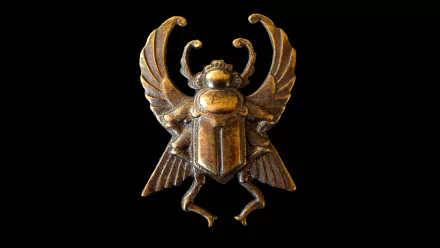 A detailed depiction of a scarab symbol in bronze, set against a black background, designed as an HD desktop wallpaper and background.