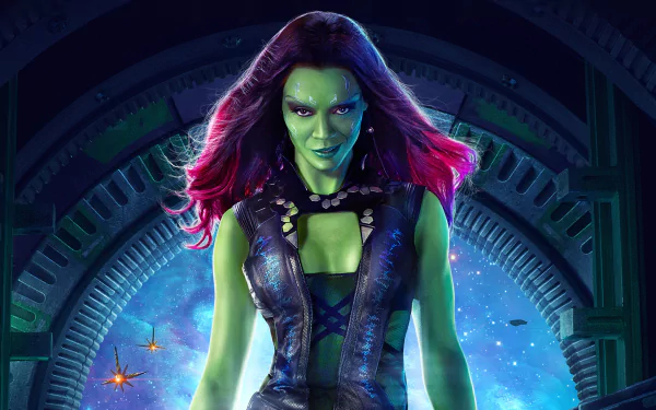 Zoe Saldana as Gamora from Guardians of the Galaxy features an HD wallpaper showcasing her vibrant green skin and striking purple hair against a cosmic background.