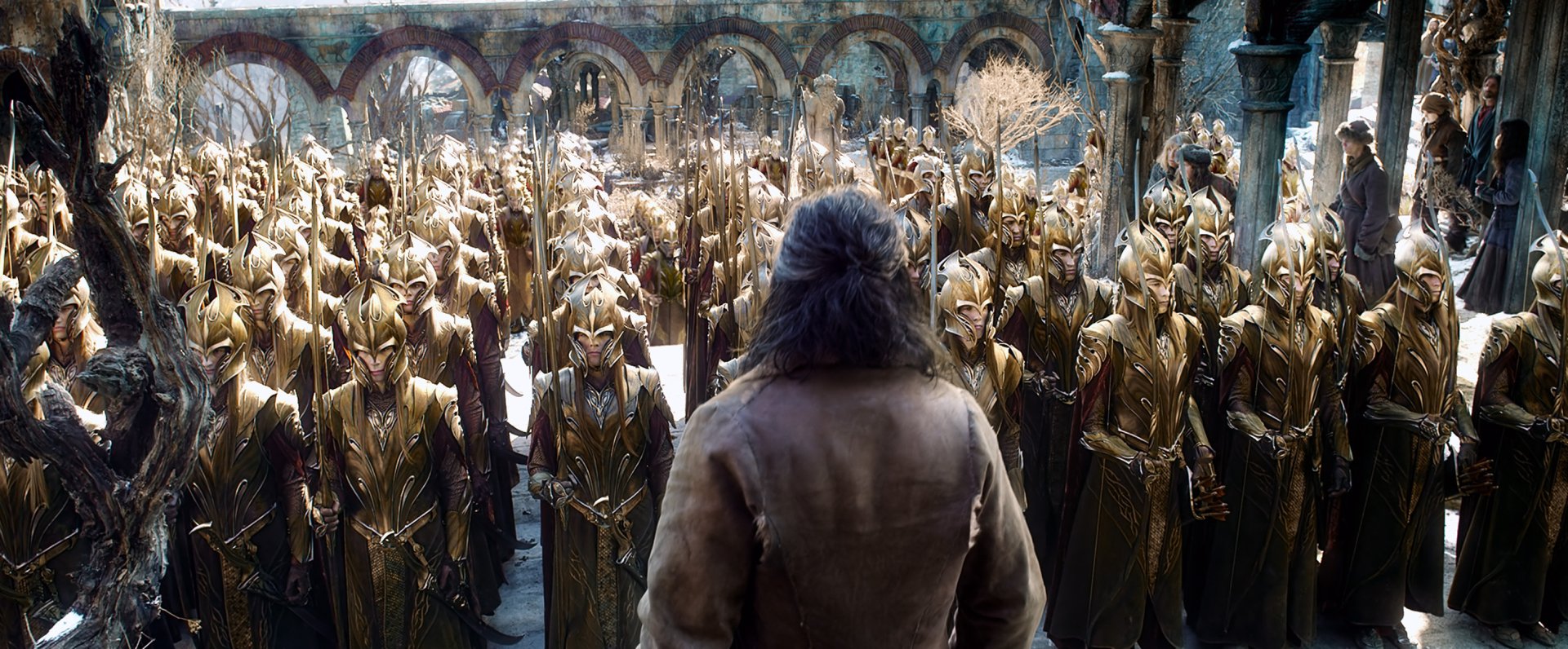 HD PC desktop wallpaper from the movie The Hobbit: The Battle of the Five Armies, featuring a scene of armored soldiers standing in formation facing a lone figure.
