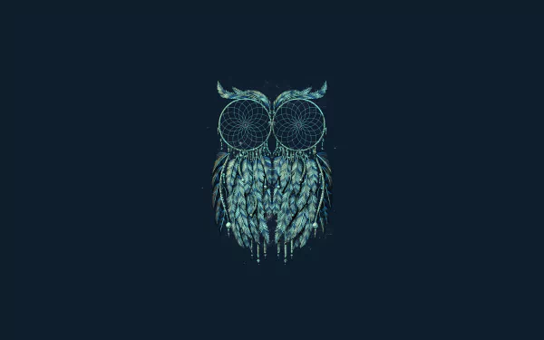 A beautifully designed dreamcatcher in the shape of an owl, featuring intricate details and a vivid color palette, creating an artistic and tranquil HD desktop wallpaper.