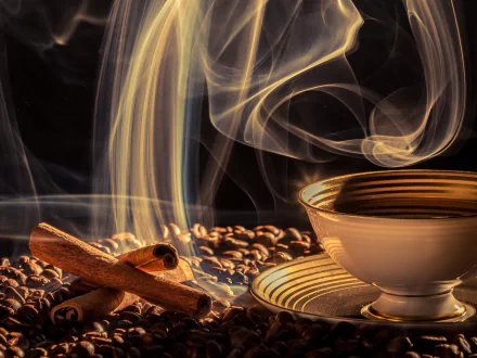 A steaming cup of coffee sits among coffee beans and cinnamon sticks, creating a warm and inviting atmosphere in this HD desktop wallpaper.