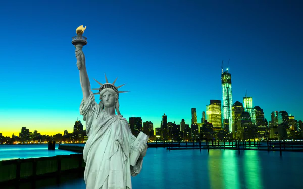 Stunning HD desktop wallpaper of New York, featuring the Statue of Liberty in the foreground with a twilight cityscape and reflective waters in the background.