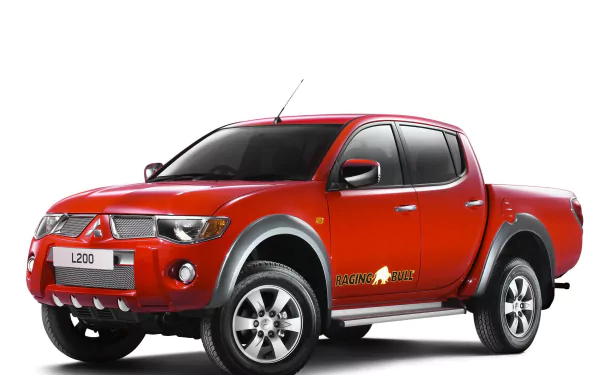 HD PC desktop wallpaper: red Mitsubishi L200 pickup truck (jeep-style vehicle) on a white background.