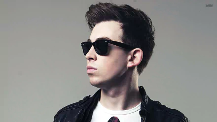 HD PC desktop wallpaper featuring a stylish portrait of Hardwell wearing sunglasses, representing electronic music culture.