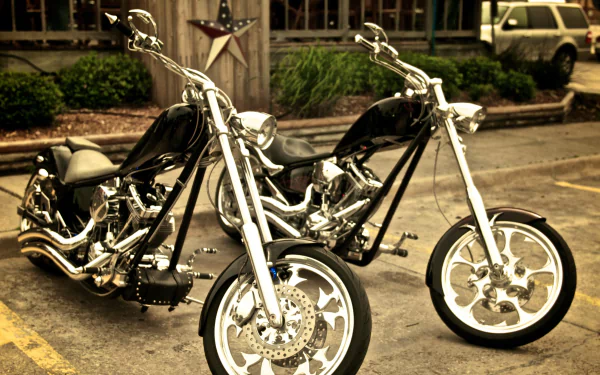 Two chrome-accented chopper motorcycles parked on a street, high-detail 4K Ultra HD PC desktop wallpaper and background showcasing custom vehicles