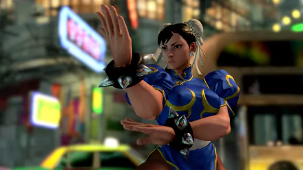 Chun-Li from Street Fighter V poses dynamically in this HD PC desktop wallpaper, set against a vibrant city backdrop, showcasing her iconic fighting style and design.