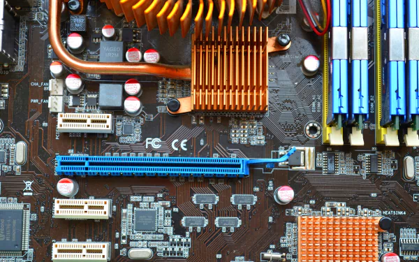 Close-up of a motherboard featuring intricate circuitry and components, showcasing modern computer technology. This HD image serves as a dynamic desktop wallpaper.