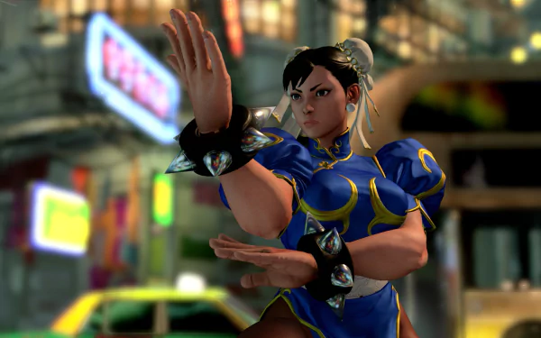 Chun-Li from Street Fighter V poses dynamically in this HD PC desktop wallpaper, set against a vibrant city backdrop, showcasing her iconic fighting style and design.