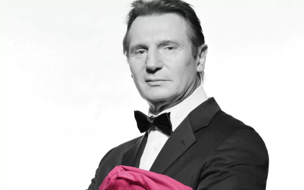 HD wallpaper featuring a monochrome portrait of a man in a tuxedo, holding a pink cloth, suitable as a desktop background.