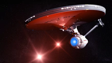 A vibrant HD wallpaper featuring the USS Enterprise from Star Trek, soaring through space with glowing stars against a dark cosmic backdrop. A striking Sci-Fi scene.