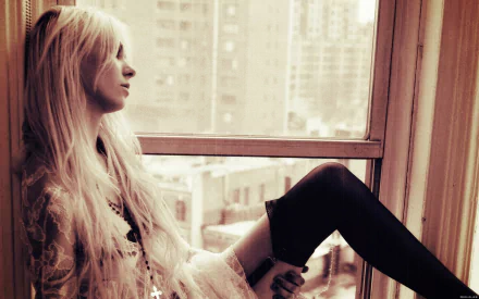 HD desktop wallpaper featuring Taylor Momsen sitting by a window, gazing outside, capturing a moody and contemplative music-inspired atmosphere.