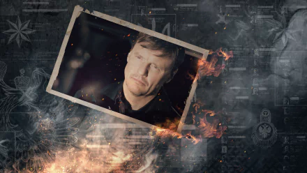 HD PC desktop wallpaper featuring a character from the video game Payday 2 with fire and map elements in the background.