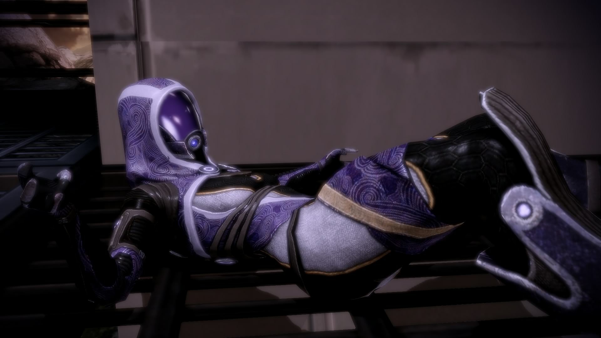 Tali'Zorah from Mass Effect in her purple quarian suit, reclining in a cinematic pose — HD PC desktop wallpaper/background.
