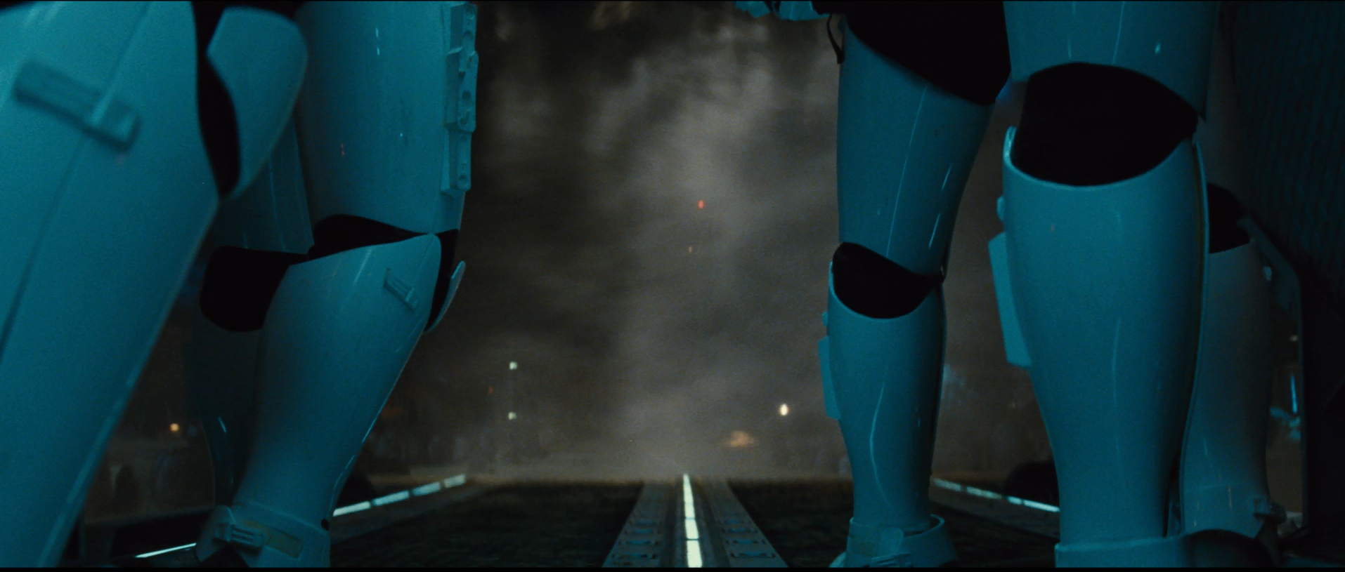 HD PC desktop wallpaper from the movie Star Wars Episode VII: The Force Awakens, showing two Stormtroopers' legs flanking a misty ship ramp with faint glowing walkway lights.