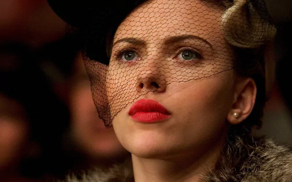 Close-up of Scarlett Johansson wearing a black veil and red lipstick in a scene from the movie The Black Dahlia, featured as an HD PC desktop wallpaper.