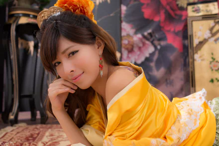 A smiling Taiwanese woman with earrings and visible tattoo, dressed in a vibrant yellow hair-dress and gown, captured in a detailed 4K Ultra HD wallpaper.