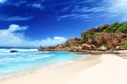 A vibrant 4K Ultra HD view of La Digue Island's tropical beach in Seychelles, featuring clear ocean waves, sandy shore, rocky formations, and a bright blue sky.