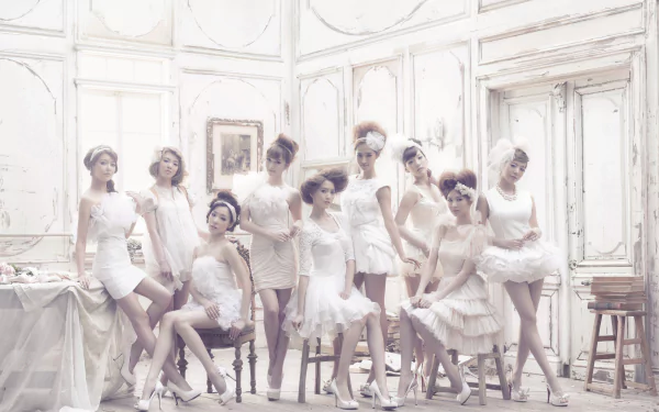 HD PC desktop wallpaper of a Korean K-pop girl group of Asian women in white dresses posed in a bright, vintage parlor, conveying an elegant music/pop concept.