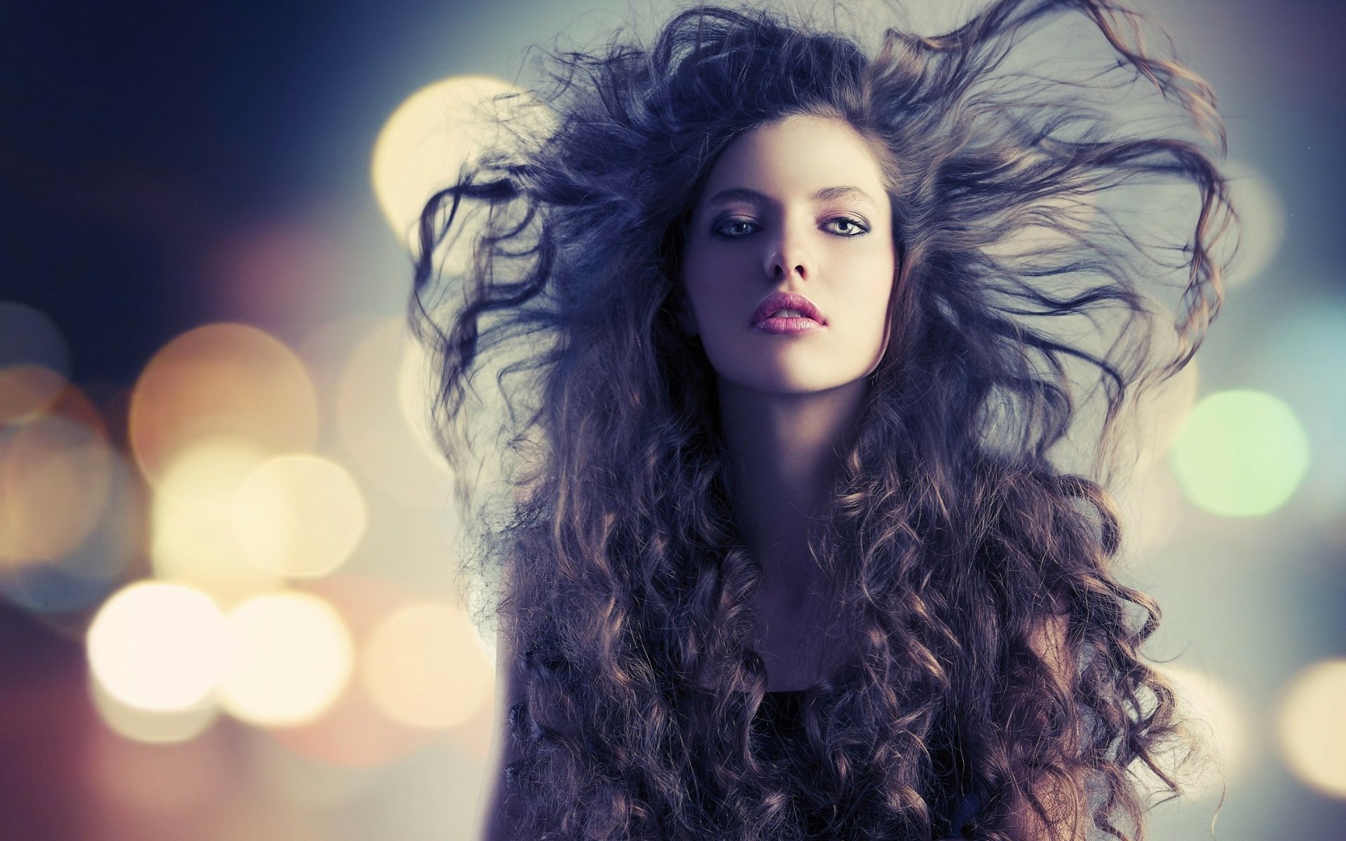 HD Wallpaper of a Woman with Beautifully Blurred Hair